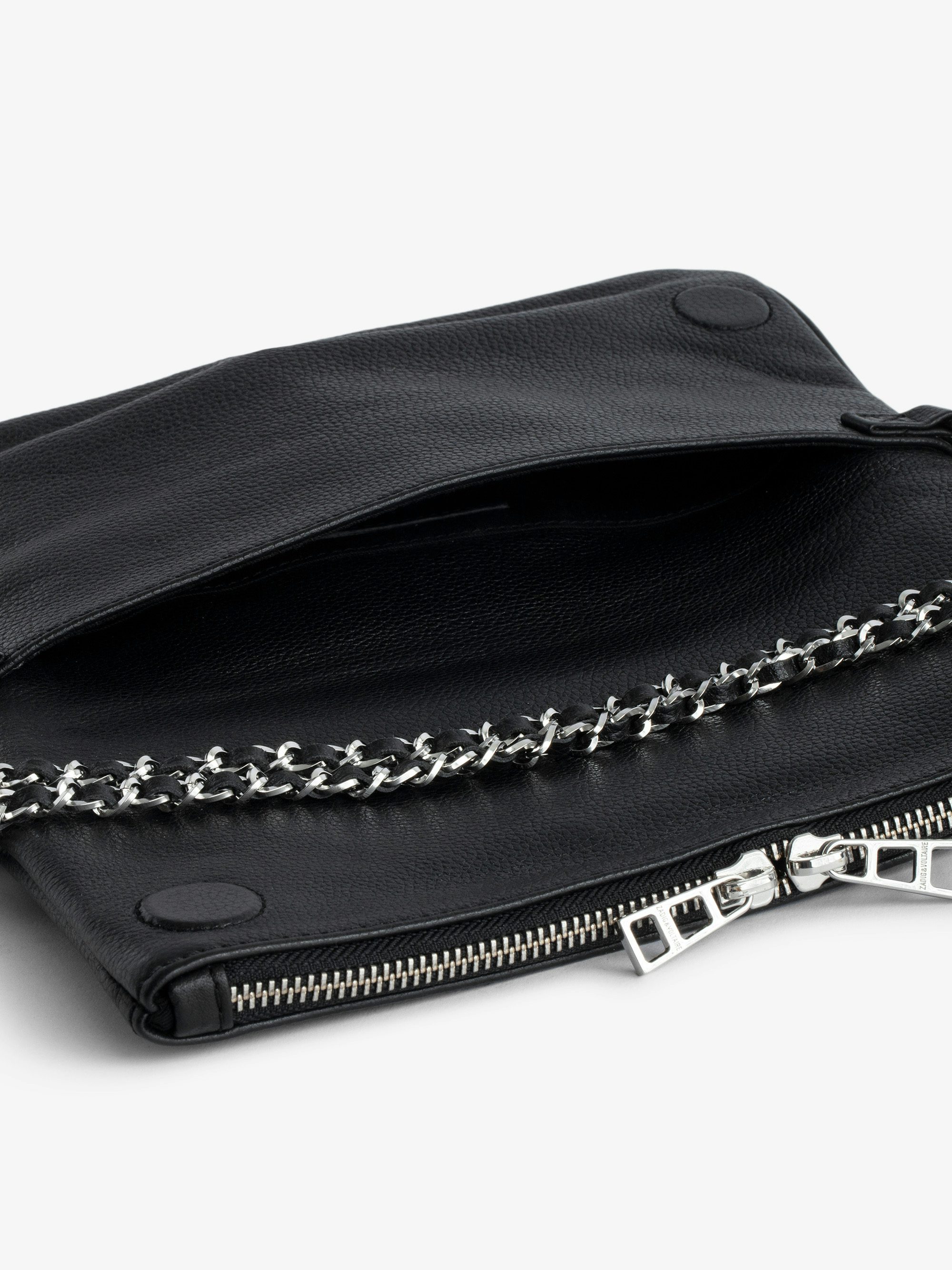Rock Clutch - The iconic Rock women's leather clutch will take you seamlessly from day to evening.
It features a double chain and leather strap, so you can choose to wear it across the body or on the shoulder.